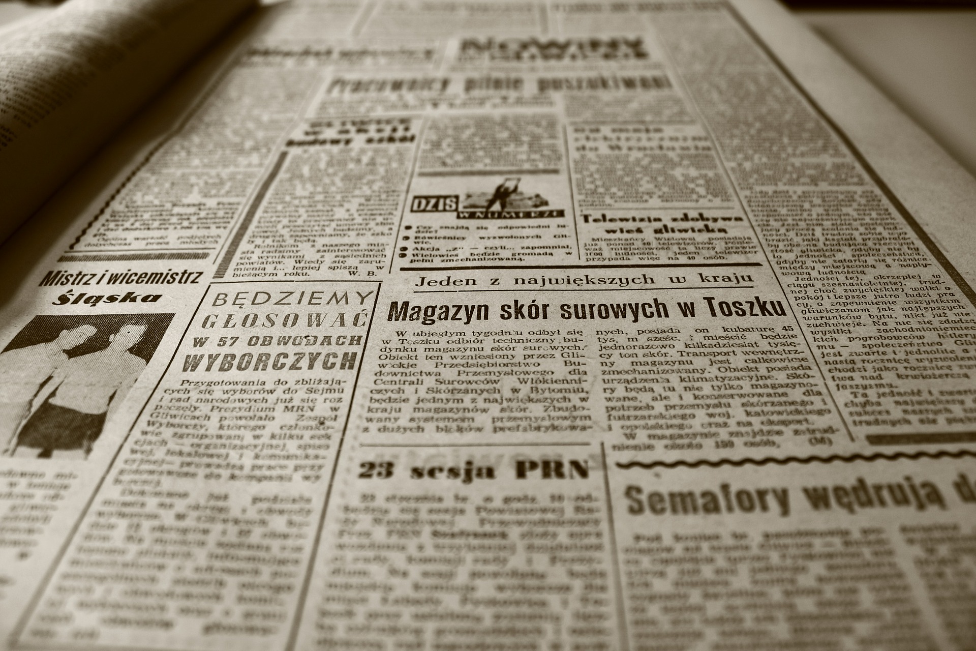 Vintage Newspaper that is written in a Nordic language with indiscernible text.